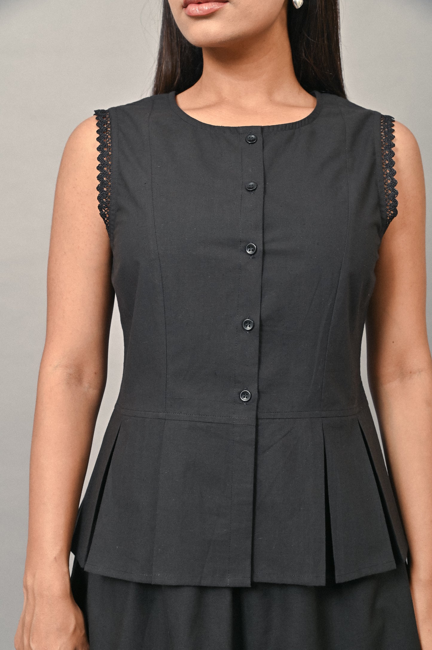Black cotton peplum top button detail