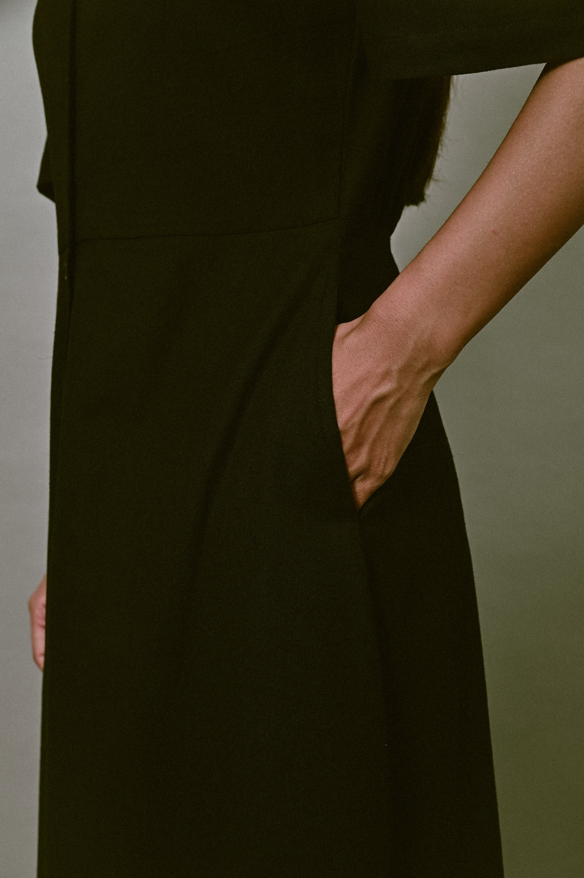 Black linen dress with side pocket detail